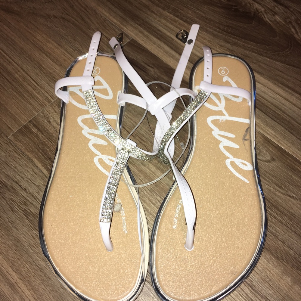 Name blue shoes with Rhinestones on the straps all white size 9 in women